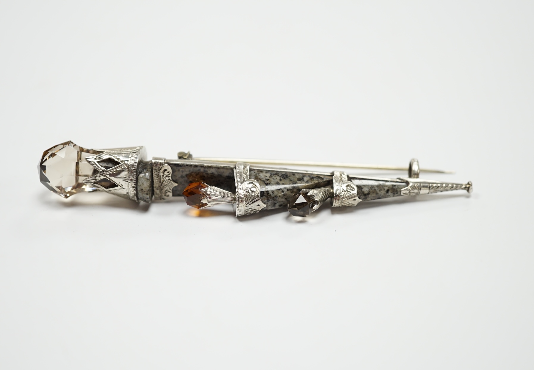A white metal, Scottish hardstone and gem set dirk brooch, 94mm.